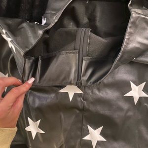 Faux black leather skirt with white stars